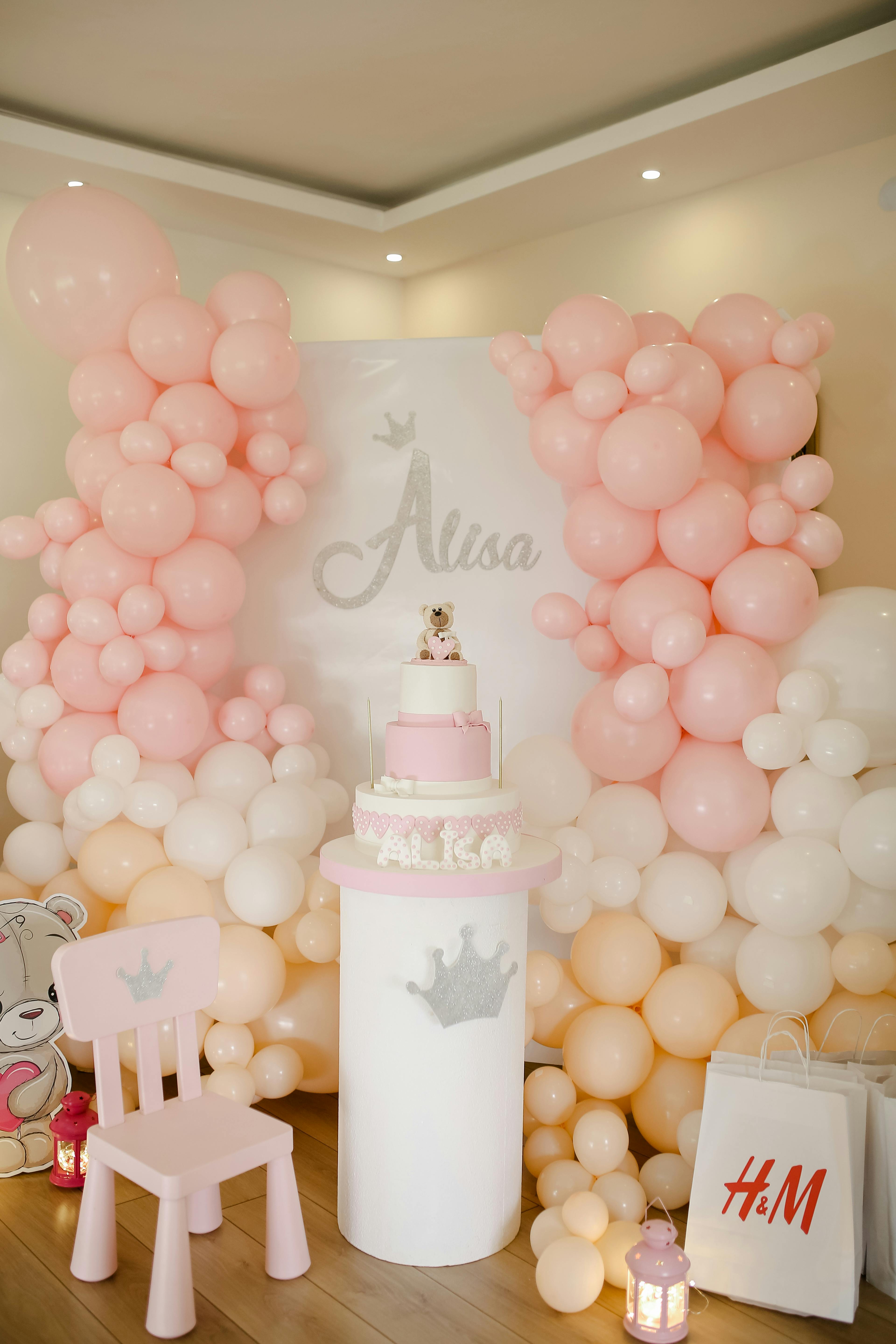 Elegant luxury birthday party décor setup with balloons and backdrop